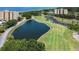 Aerial view of condo community with golf course and bay at 2616 Cove Cay Dr # 506, Clearwater, FL 33760