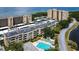 Condo building, parking, pool, and waterfront view at 2616 Cove Cay Dr # 506, Clearwater, FL 33760