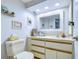 Small bathroom with single vanity, toilet, and updated finishes at 2616 Cove Cay Dr # 506, Clearwater, FL 33760