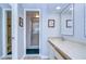 Clean bathroom with double vanity, shower, and updated finishes at 2616 Cove Cay Dr # 506, Clearwater, FL 33760