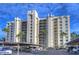 Exterior view of Cove Cay building with parking at 2616 Cove Cay Dr # 506, Clearwater, FL 33760