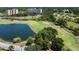 View of a golf course with a pond at 2616 Cove Cay Dr # 506, Clearwater, FL 33760