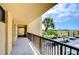 Condo hallway with balcony access and water views at 2616 Cove Cay Dr # 506, Clearwater, FL 33760