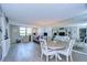 Condo living room with dining area and hardwood floors at 2616 Cove Cay Dr # 506, Clearwater, FL 33760