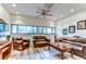 Comfortable living room with leather furniture and hardwood floors at 2616 Cove Cay Dr # 506, Clearwater, FL 33760