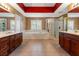 Main bathroom with double vanity, soaking tub, and shower at 21631 Cormorant Cove Dr, Land O Lakes, FL 34637