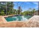 Sparkling screened pool perfect for relaxation and recreation at 21631 Cormorant Cove Dr, Land O Lakes, FL 34637