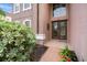 Welcoming front entrance with double doors and landscaping at 21631 Cormorant Cove Dr, Land O Lakes, FL 34637