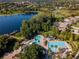 Community pool, spa, and lakefront access at 21631 Cormorant Cove Dr, Land O Lakes, FL 34637