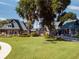 Community clubhouse with inviting exterior and landscaping at 21631 Cormorant Cove Dr, Land O Lakes, FL 34637