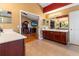 Main bathroom with double vanity and access to bedroom at 21631 Cormorant Cove Dr, Land O Lakes, FL 34637