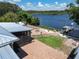 Waterfront property with patio, dock and fire pit at 2628 River Bend Dr, Ruskin, FL 33570