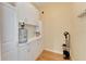 Walk-in pantry offers ample storage space for kitchen essentials at 2628 River Bend Dr, Ruskin, FL 33570