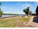 Spacious backyard with firepit, river views, and dock at 2628 River Bend Dr, Ruskin, FL 33570