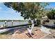 Peaceful waterfront patio with seating area at 2628 River Bend Dr, Ruskin, FL 33570