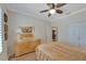 Bedroom with ceiling fan and view to dining area at 2628 River Bend Dr, Ruskin, FL 33570