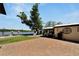 Large backyard with paver patio, overlooking the water at 2628 River Bend Dr, Ruskin, FL 33570