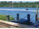 Jetski passing by a waterfront property at 2628 River Bend Dr, Ruskin, FL 33570