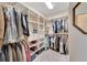 Large walk-in closet with custom shelving and ample hanging space at 2628 River Bend Dr, Ruskin, FL 33570