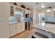Modern kitchen with granite counters, stainless steel appliances, and breakfast bar at 2628 River Bend Dr, Ruskin, FL 33570