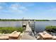 Private boat dock with lift and access to the water at 2628 River Bend Dr, Ruskin, FL 33570