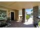 Front porch with stone columns, entryway, and walkway at 2628 River Bend Dr, Ruskin, FL 33570