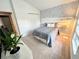 Bright bedroom with a double bed and stylish wall decor at 4801 Cypress Club Pl, Tampa, FL 33624