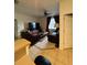 Living room with leather sofas and a large TV at 4458 Maverick St, North Port, FL 34288