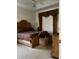 Bright bedroom with a king-size bed and sitting area at 4458 Maverick St, North Port, FL 34288