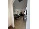 Open kitchen with breakfast bar and view into living room at 4458 Maverick St, North Port, FL 34288