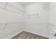 Spacious walk-in closet with wire shelving for ample storage at 9413 Ballaster Pointe Loop, Parrish, FL 34219