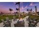 Gather around the fire pit with Adirondack chairs at 9413 Ballaster Pointe Loop, Parrish, FL 34219