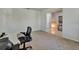 Home office features built-in shelving and a desk at 16321 Treasure Point Dr, Wimauma, FL 33598