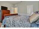 Charming bedroom with a double bed and access to a closet at 16321 Treasure Point Dr, Wimauma, FL 33598