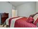 Serene bedroom with a full-size bed and neutral decor at 16321 Treasure Point Dr, Wimauma, FL 33598