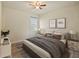 This bedroom features a plush bed, stylish nightstands, and decor for a relaxing atmosphere at 11818 Tetrafin Dr, Riverview, FL 33579