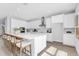 Spacious kitchen featuring white cabinets and a large center island at 2509 N Glenwood Dr, Tampa, FL 33602