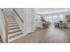 Open-concept living area boasts an inviting dining space and a modern kitchen island at 2509 N Glenwood Dr, Tampa, FL 33602