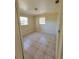 Neutral bedroom featuring tile floor, blinds and neutral walls at 4407 N 41St St, Tampa, FL 33610