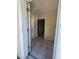 Inviting entryway with tiled floor, offering a glimpse into the layout of the home with multiple doorways at 4407 N 41St St, Tampa, FL 33610