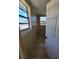 Functional laundry area with tiled floors and natural lighting, ready for customization at 4407 N 41St St, Tampa, FL 33610