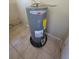 Close-up of a Rheem water heater, showcasing the mechanical components of the home's utility systems at 4407 N 41St St, Tampa, FL 33610
