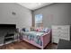 Bedroom with twin bed, dresser, and a TV at 3823 65Th E Ave, Sarasota, FL 34243
