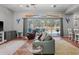 Living room with a view of the pool and backyard at 3823 65Th E Ave, Sarasota, FL 34243