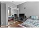 Bright bedroom with mirrored closet and two beds at 3823 65Th E Ave, Sarasota, FL 34243