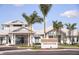 Elegant community clubhouse with welcoming entrance and landscaping at 9417 Shorebird Ct, Parrish, FL 34219