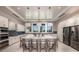 Modern kitchen with large island and stainless steel appliances at 9417 Shorebird Ct, Parrish, FL 34219