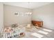 Bedroom with crib, changing table, and plenty of natural light at 14292 Swiss Bridge Dr, Riverview, FL 33579