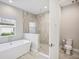 Spa-like bathroom with soaking tub and separate shower at 14292 Swiss Bridge Dr, Riverview, FL 33579