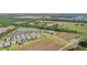 Aerial view of community with lake and landscape at 14292 Swiss Bridge Dr, Riverview, FL 33579